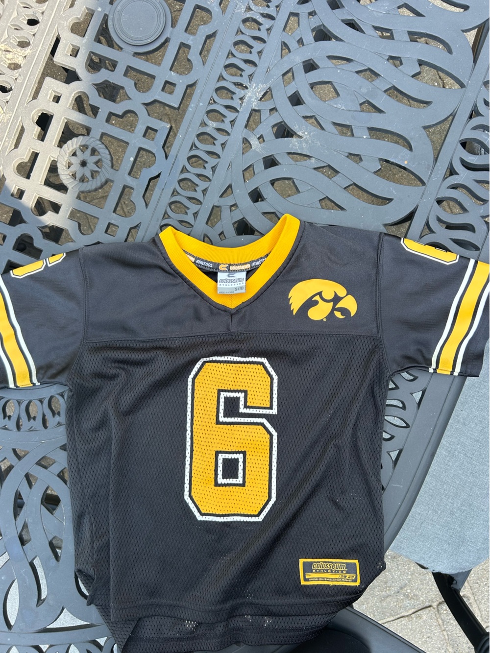 Iowa Colosseum Black and Gold Athletic Jersey Collar Detail